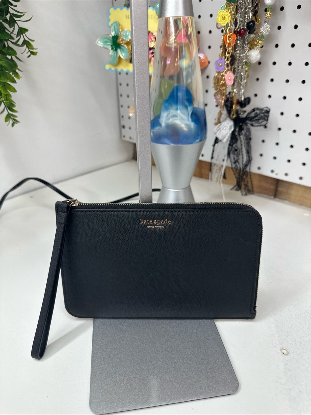 kate spade black leather zip wristlet with gold logo